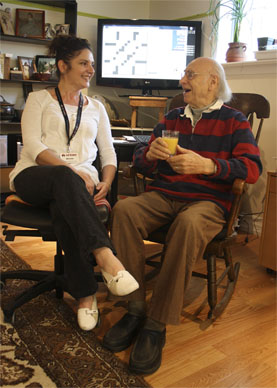 Senior and Caregiver in discussion