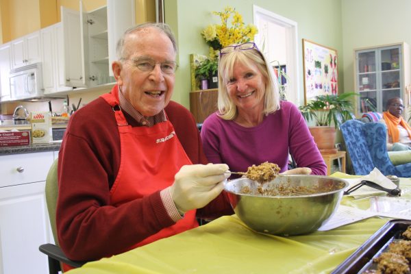 Activationist and client with mixing bowl