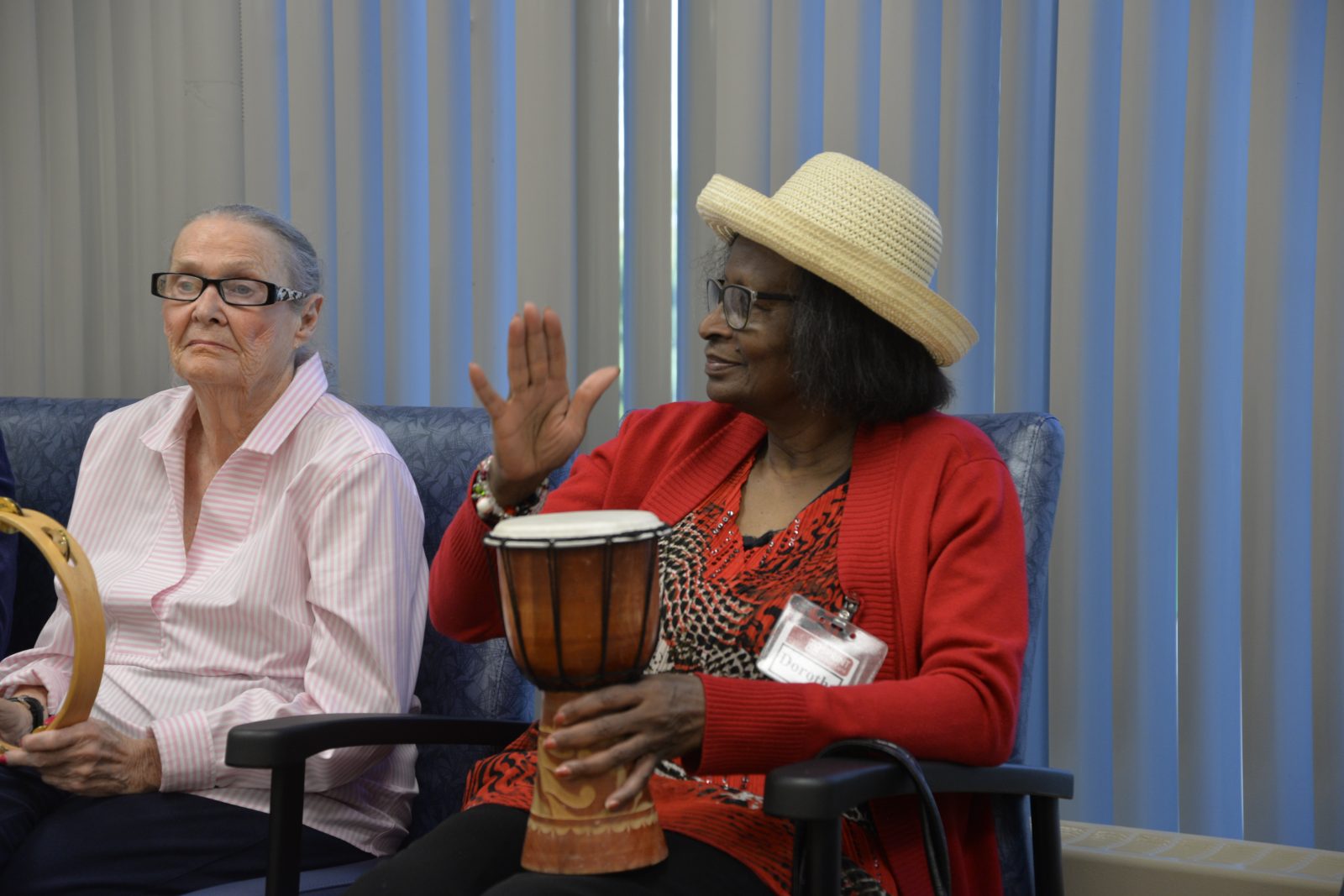 senior lady playing drum