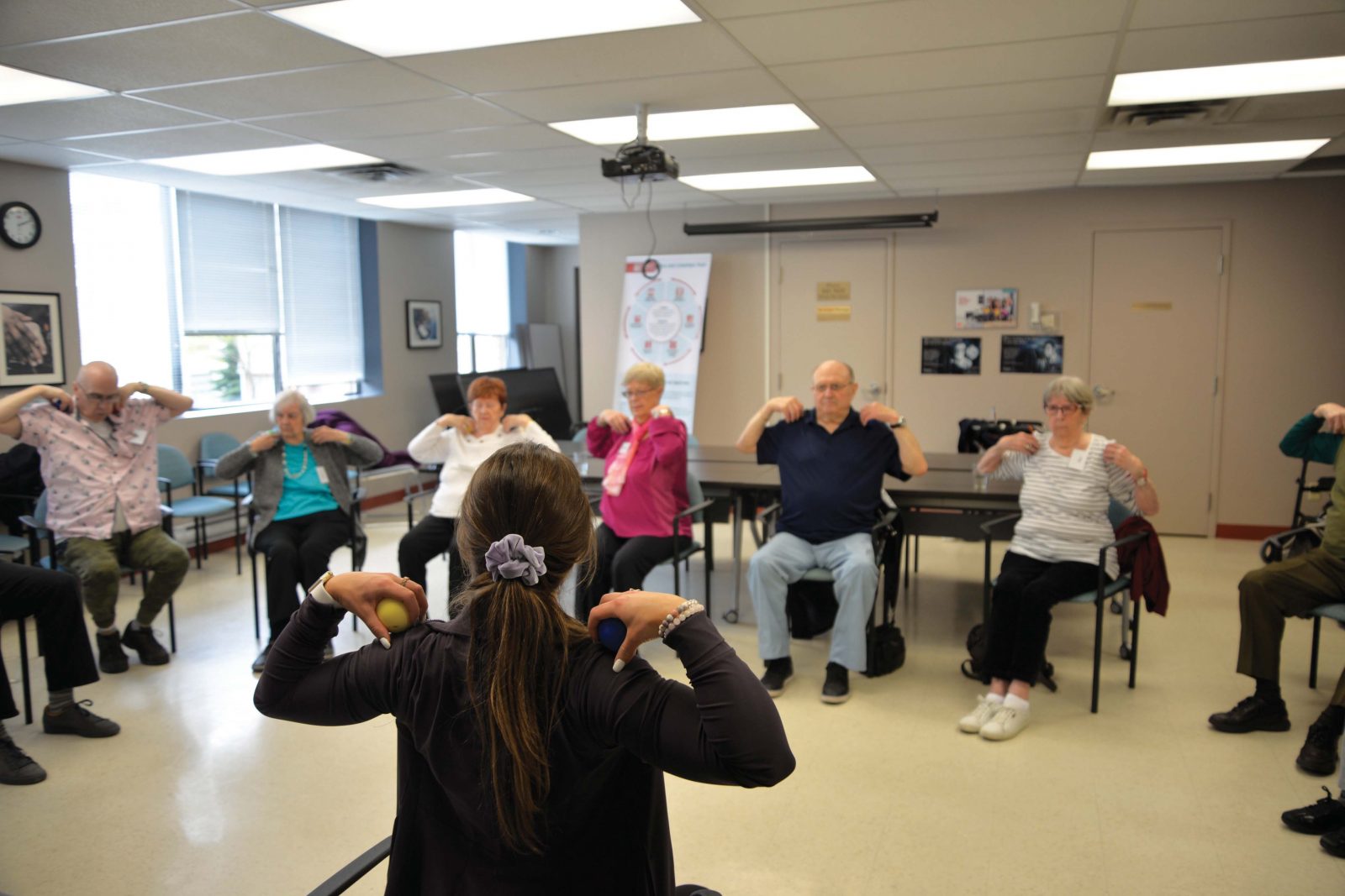 Seniors in Seated Yoga class